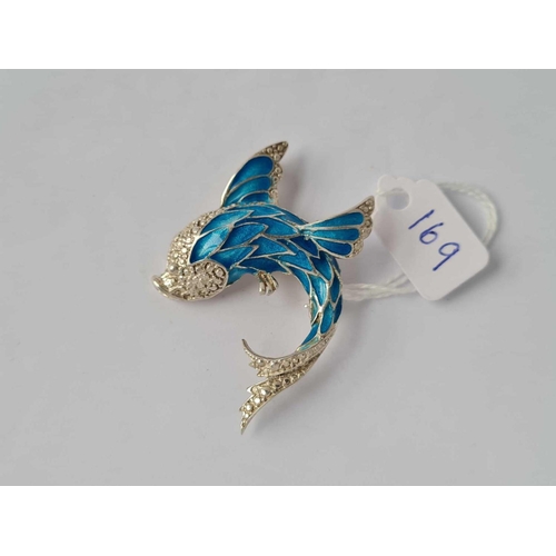 169 - A silver and blue enamel dolphin brooch