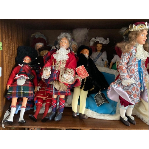 1708 - A shelf of aproximately 15 costume dolls, many by Peggy Nesbitt incl; Sherlock Holmes, Henry VIII