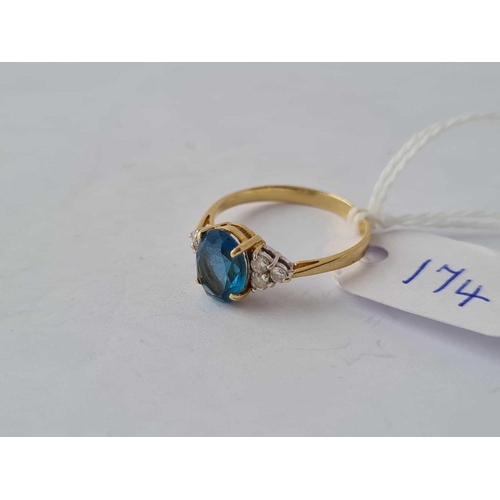 174 - A oval blue stone ring set in 14ct gold size L - 1.9 gms