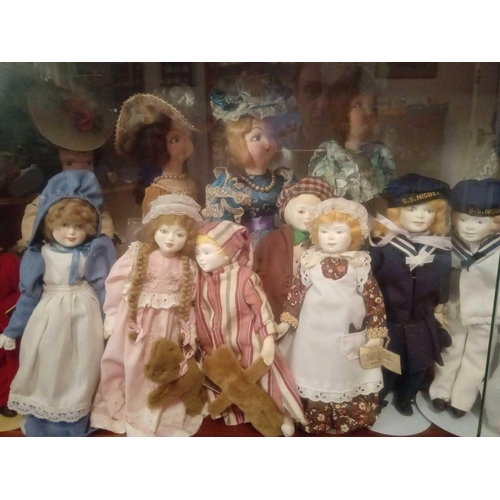 1950 - Shelf of Peggy Nesbitt & other dolls approximately 30