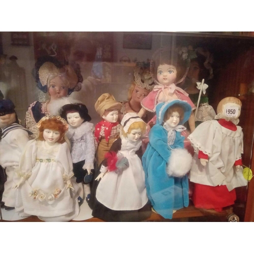 1950 - Shelf of Peggy Nesbitt & other dolls approximately 30