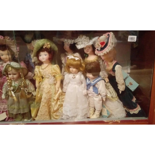 1951 - A shelf of Peggy Nesbitt & other dolls approx 24