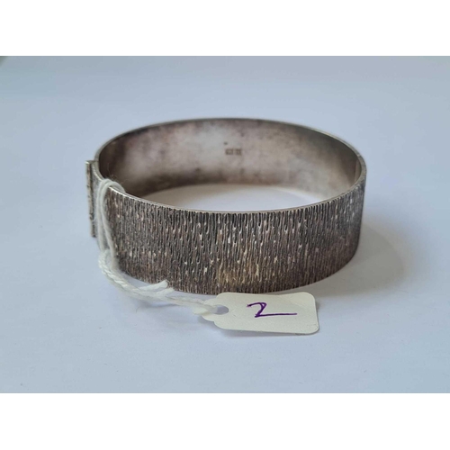 2 - A wide bark effect hinged silver bangle - 33 gms