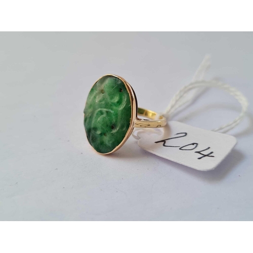 204 - A high carat carved jade panel ring 2.9g inc