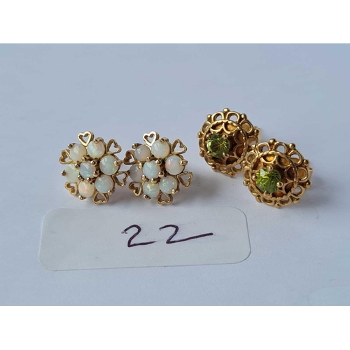 22 - A pair of peridot set earrings and opal cluster earrings both 9ct