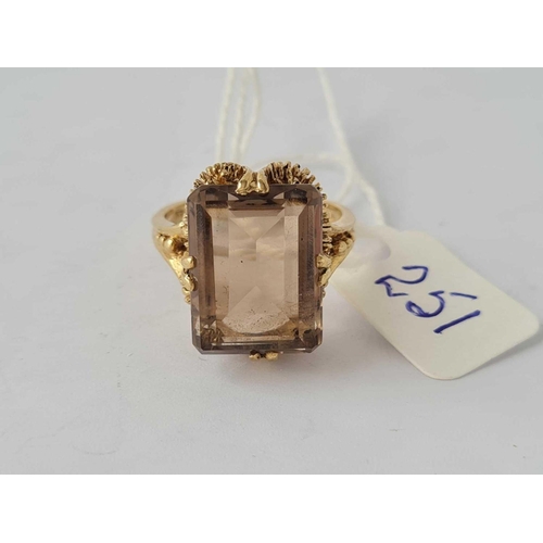 251 - A large rectangular Smokey quartz ring in fancy hand made fancy mount 9ct size P - 6.7 gms