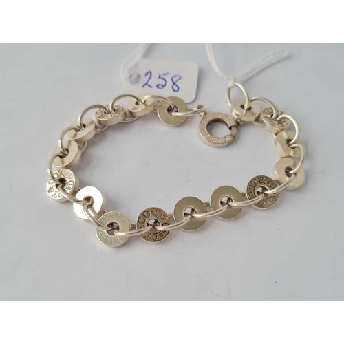 258 - A Tiffany and Co circular link silver bracelet every third link stamped Tiffany and Co - 23.2 gms