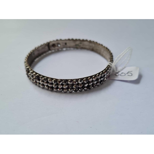 305 - A cut steel bangle