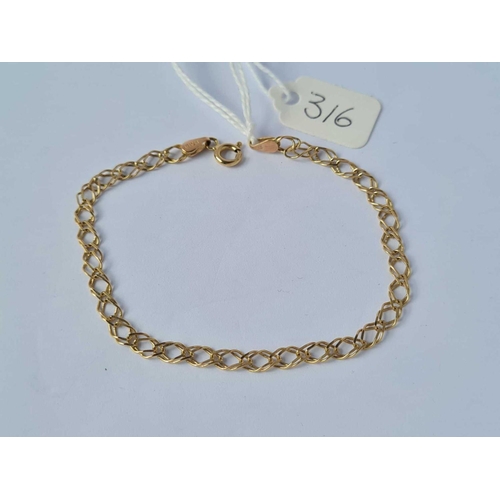 316 - A small double link 9ct bracelet 2.1g