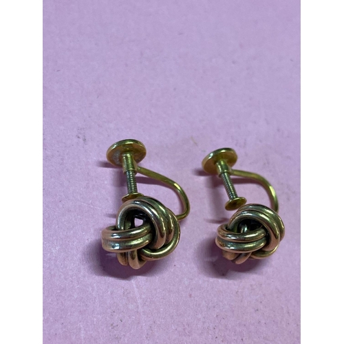 32 - A pair of pearl and gold ear clips