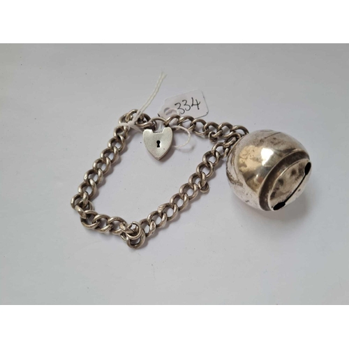 334 - A silver bracelet with a silver bell 28.5g Birm