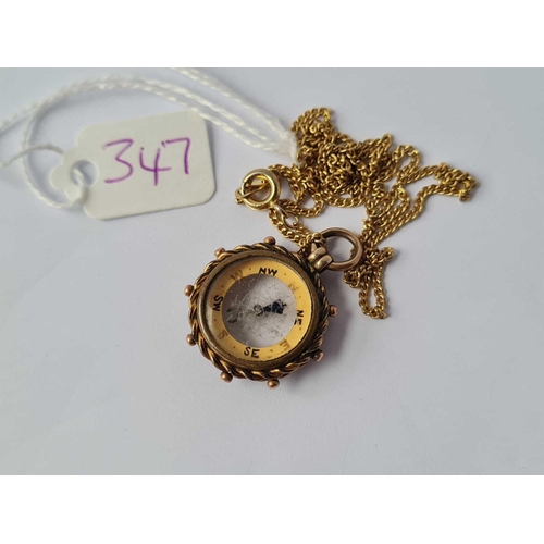 347 - A gilt compass pendant on gilt chain