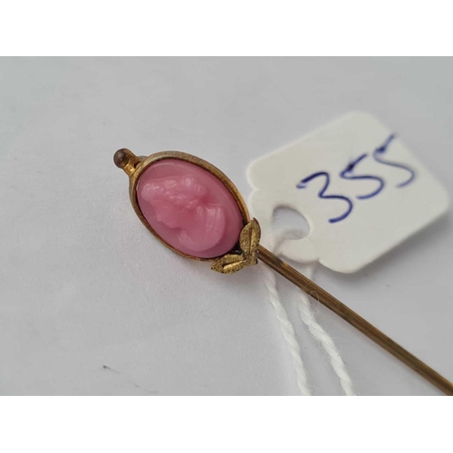 355 - A Vintage coral stick pin.