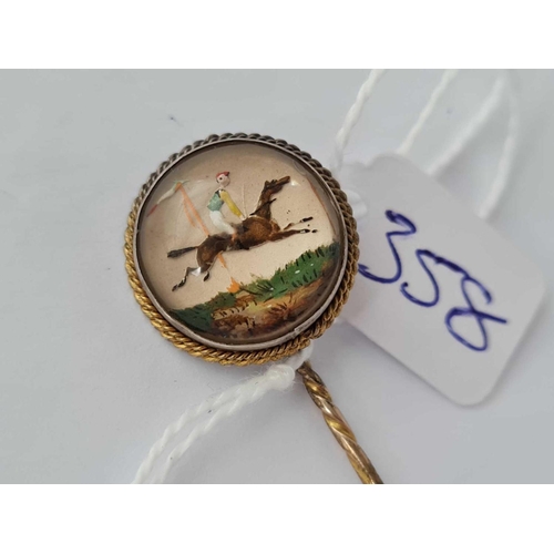 358 - A RARE ESSEX CRYSTAL STICK PIN DEPICTING A RACEHORSE PASSING WINNING POST