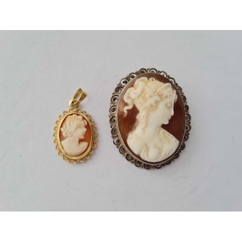 372 - A cameo pendant 9ct and a silver example