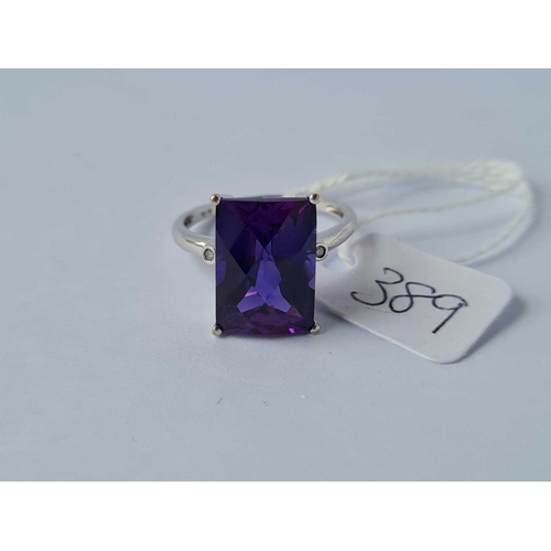 389 - A rectangular cushion cut colour changing amethyst in 9ct mount size O 4g inc