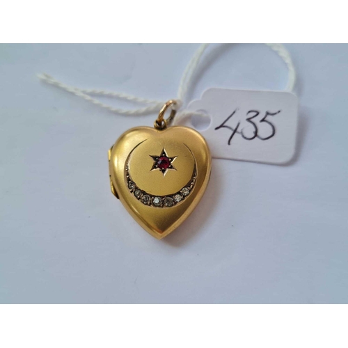 435 - A gold back & front stone set heart locket