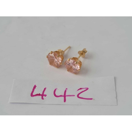 442 - A pair of pink stone ear studs