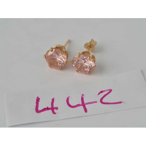 442 - A pair of pink stone ear studs