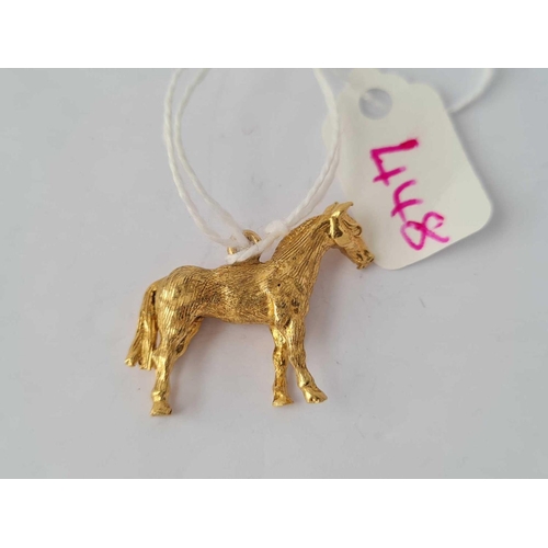 448 - A charm  in the form of a horse 9ct - 6.1 gms