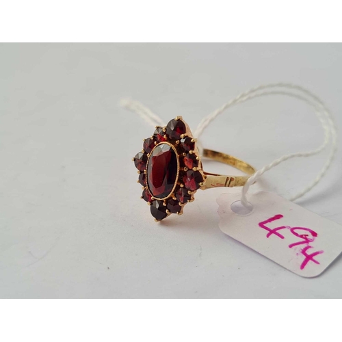 494 - A garnet cluster ring 14ct gold size S - 3.6 gms