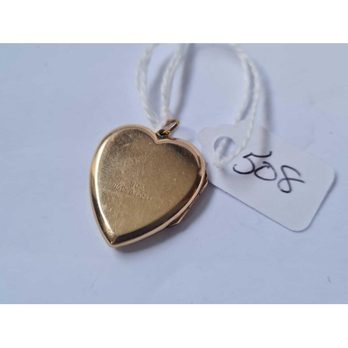 508 - A stone set 9ct back & front locket