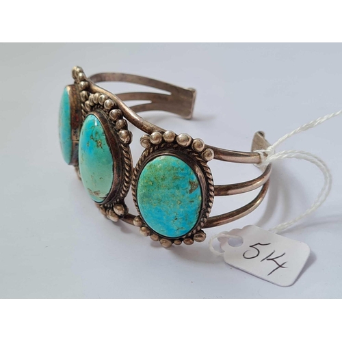 514 - A metal Turquoise bangle