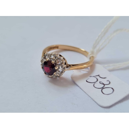 530 - A garnet and white stone 9ct cluster ring size O 2.7g inc