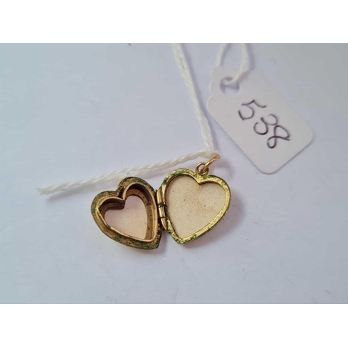 538 - A small 9ct back & front heart locket