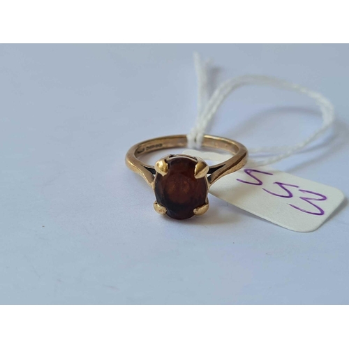 553 - A garnet ring 9ct size J - 2.5 gms