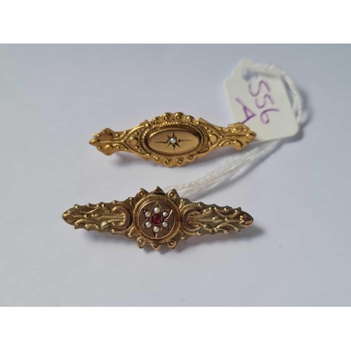 556a - Two 9ct brooches - 3.6 gms