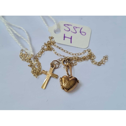 556h - A cross and heart on 9ct chain 16 inches