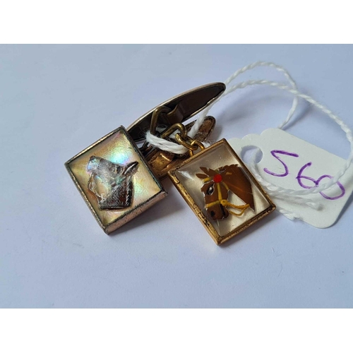 560 - A pair of gilt race horse cufflinks