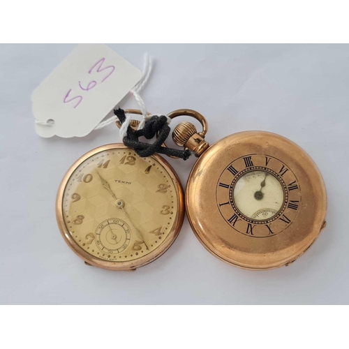 563 - A rolled gold gents half hunter pocket watch with seconds dial (hands missing) and rolled gold Tempo... 