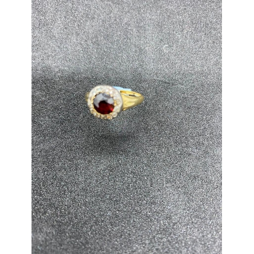 59 - A attractive garnet and diamond cluster ring 9ct gold size S - 4.8 gms