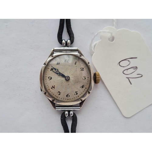 602 - A vintage ladies silver wrist watch