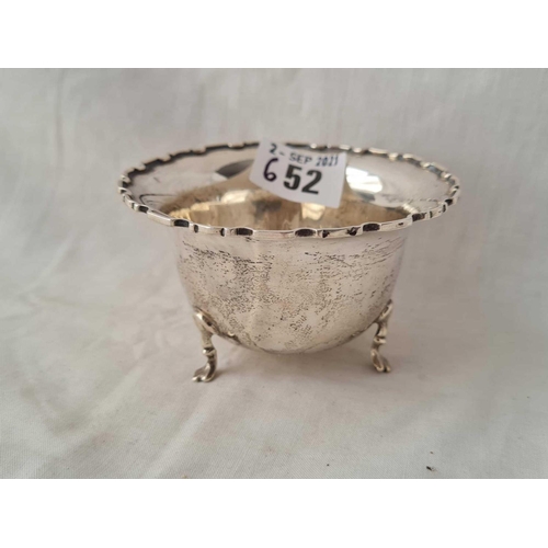 652 - A bowl with mounted edge on three pad feet 3.75