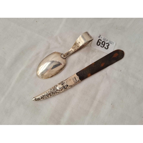 693 - A mounted tortoise shell letter opener and a Hey, Diddle, Diddle childs spoon (damaged)