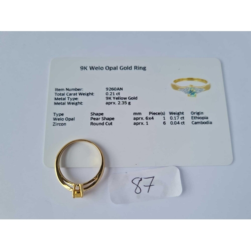 87 - A yellow pear shaped opal set in 9ct mount comes with certificate