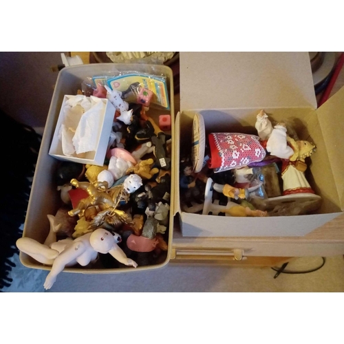 1602 - Two boxes of articulated dolls etc