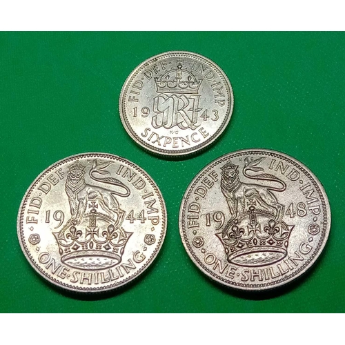 1161 - A sixpence 1943 and shillings 1944 and 1948 unc