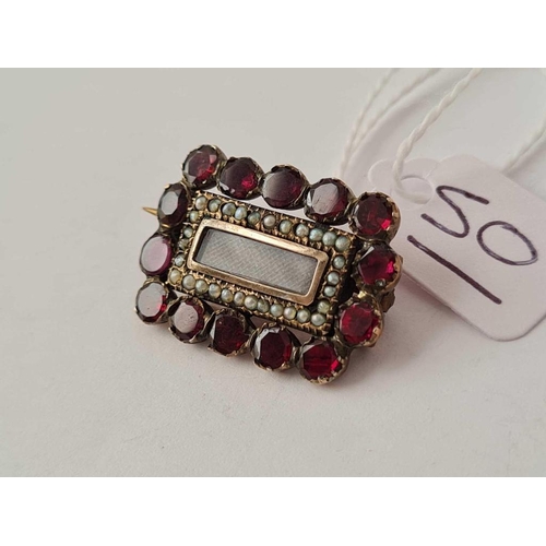 50 - A Georgian garnet and pearl gold memorial brooch