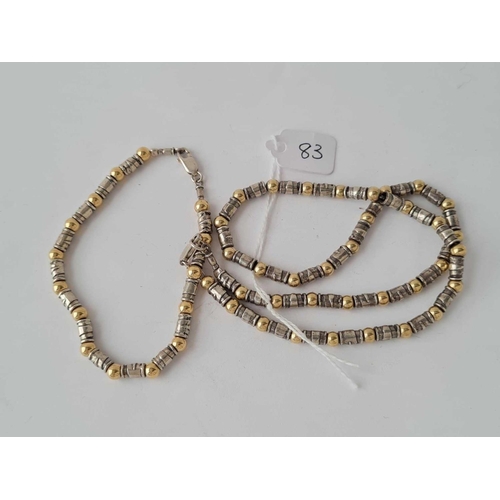83 - A silver bead necklace and matching bracelet 41g