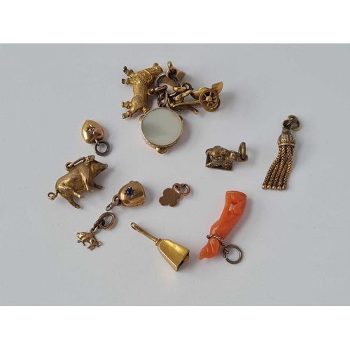 20 - Assorted gold and coral and metal charms