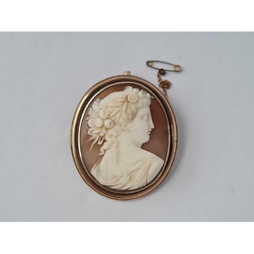 30 - A Victorian gold mounted shell cameo brooch of classical goddess