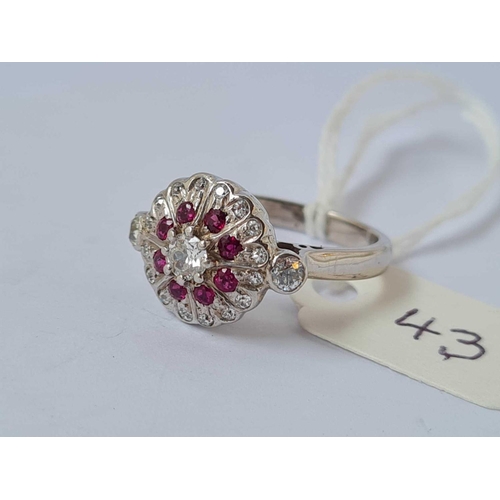 43 - A VINTAGE RUBY AND DIAMOND CLUSTER RING 18CT WHITE GOLD SIZE L