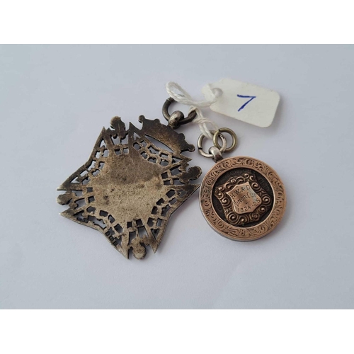 7 - A silver gilt and enamel fob together with a Maltese cross fob in silver 1906