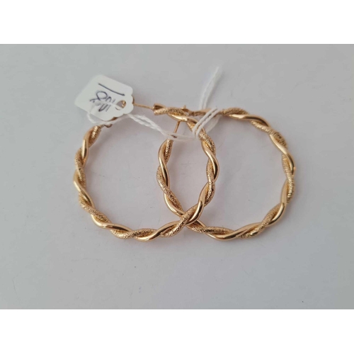 108 - A pair of large gold plated creole hoop earrings