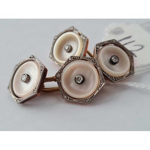 112 - A PAIR OF 18CT GOLD AND PLATINUM DIAMOND SET M O P CUFFLINKS - 8.9 GMS