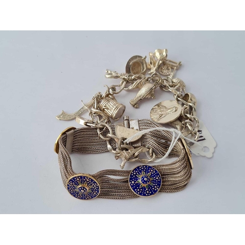 117 - A silver and enamel bracelet together with a silver charm bracelet - 78 gms